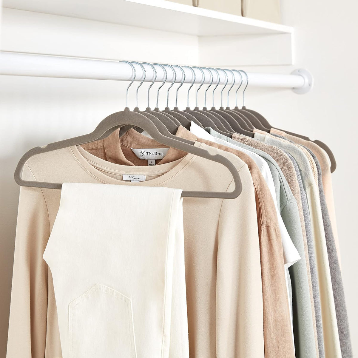 Amazon Basics Slim Velvet Non-Slip Space Saving Suit Clothes Hangers, Sturdy Construction, Navy Blue/Rose Gold, 50-Pack