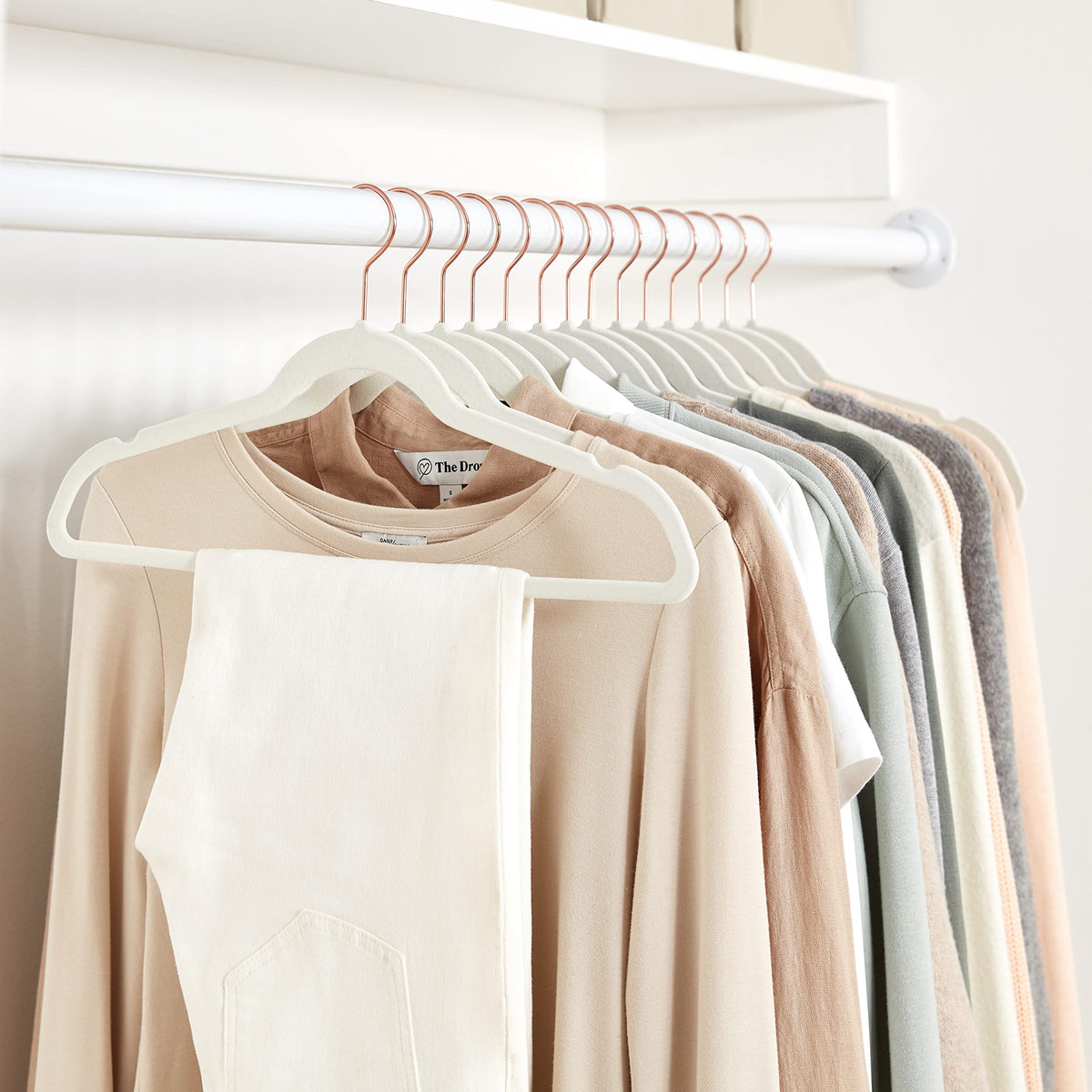 Amazon Basics Slim Velvet Non-Slip Space Saving Suit Clothes Hangers, Sturdy Construction, Navy Blue/Rose Gold, 50-Pack